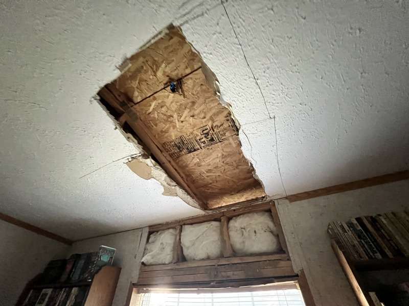 Indoor roof damage before our repairing services